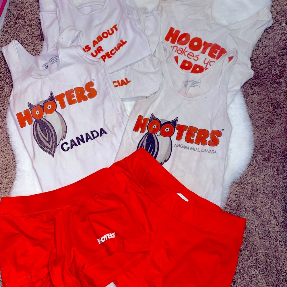 LOT OF AUTHENTIC HOOTERS UNIFORMS-USED different sizes & places MAKE AN OFFER
